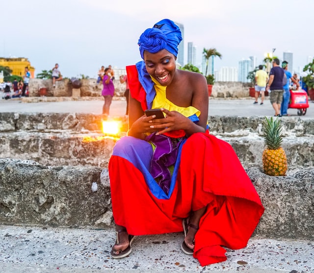 Beautiful woman in Colombia dressed in the colours of the flag